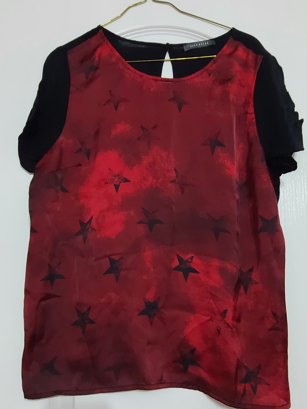 Suzy Shier Red Star Print Blouse with Black Sleeves